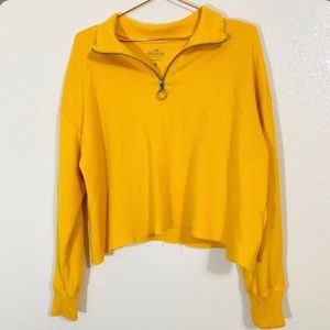 a yellow quarter zip long sleeve